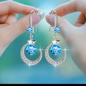 925 Sterling Silver Star Moon Earrings.